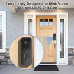 Side perspective of the anti theft doorbell mount installed on a smooth apartment entryway door showing slim profile