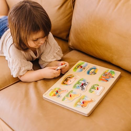 Top view of 8 piece Melissa & Doug wooden sound puzzle