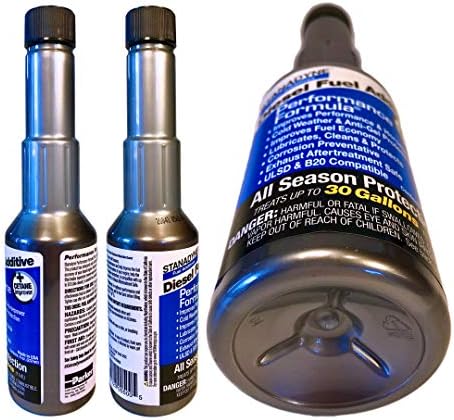 Group shot of the imported Stanadyne diesel additive pack displaying the complete four bottle set