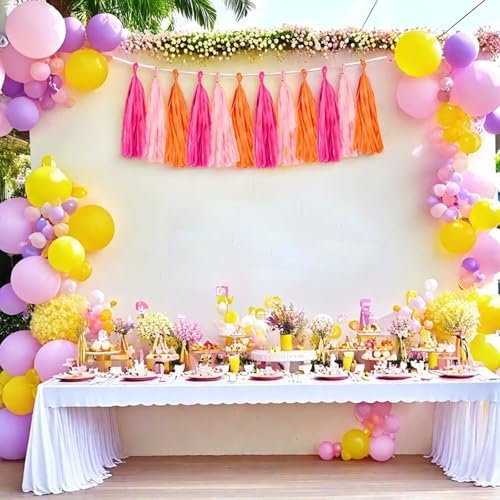 Aimto multi-color festive fringe banner arranged beautifully over an elegant dessert table display