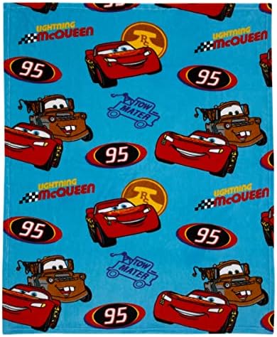 Close up of the soft plush texture of the Disney Cars toddler blanket.