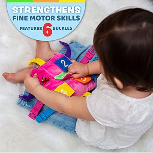 Buckle Toys Bella Square sensory toy demonstrating the six color matching straps and diverse plastic buckles