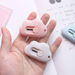 Close-up of the plastic housing and slide-lock mechanism