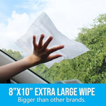 Extra large 8 by 10 inch glass cleaning wipe being used on a car windshield.