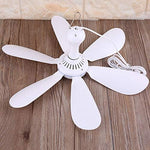VizGiz travel fan packaging contents displaying the motor unit, six separate leaves, and informational booklet.