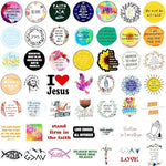 Assorted religious scripture vinyl stickers arranged neatly alongside a Bible study journal and journaling supplies.