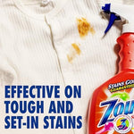 Zout stain remover being sprayed on a grass stain for pre-treatment