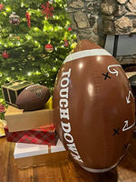 Close up view of the printed strategy play calls on the GiftExpress jumbo football.