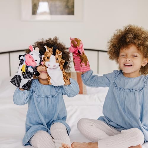 Close up of soft plush texture on Melissa & Doug farm animal puppets.