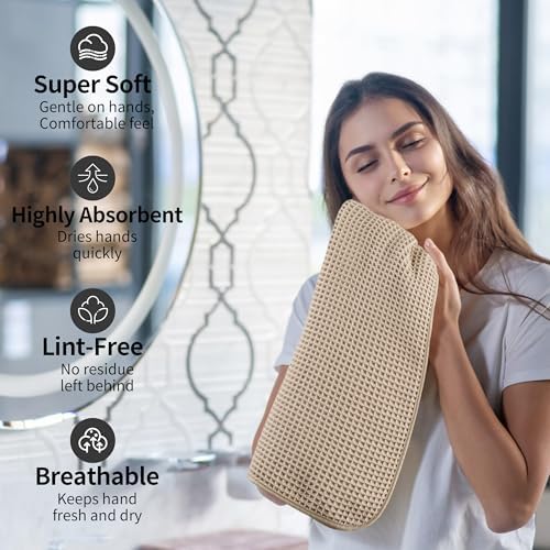 Lifestyle shot of beige hand towel hanging in a modern bathroom
