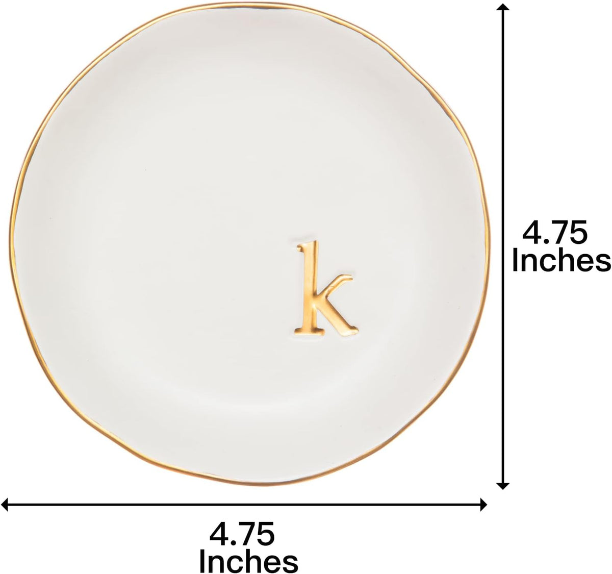 White ceramic ring dish with gold trim on nightstand