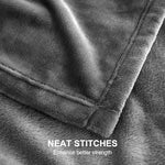 Premium grey Hansleep flannel blanket showing the detailed stitched edges and border quality