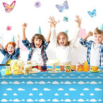 Three blue sky and cloud patterned party tablecloths folded