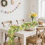 DR.DUDU Easter egg garland with warm white LED lights illuminated in a dark room