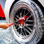 Close up of the soft synthetic wool brush head removing brake dust from premium alloy wheels