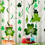Eight foot long green shamrock garland styled neatly across a home fireplace mantel and wall