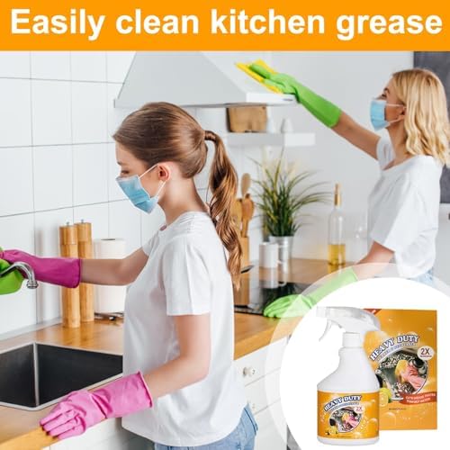 Active foaming kitchen cleaner spray dissolving tough grease on a stainless steel stovetop
