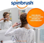 Close-up view of the small soft bristle power head and oscillating spinning mechanism of the children battery toothbrush