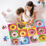 Children playing with three by two feet massive educational jigsaw toy on a playroom floor