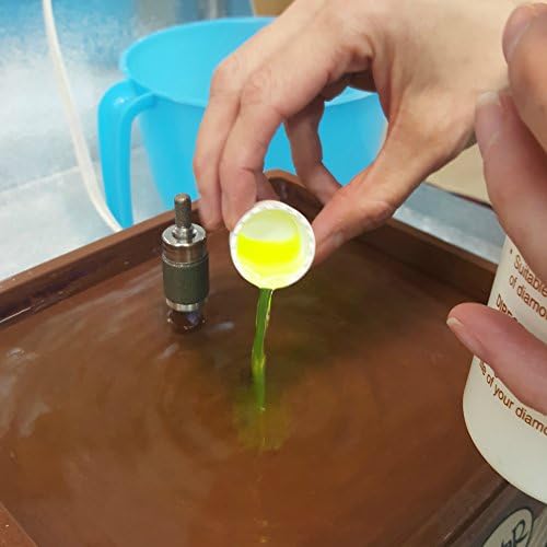 Novacan glass tool accessory bottle highlighting the eighty ounce fluid capacity formulation.