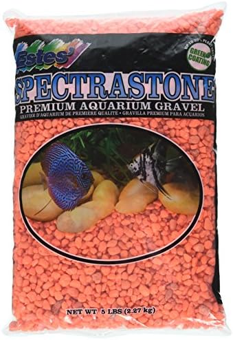 Vibrant orange neon aquarium gravel close up texture