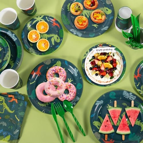 Cecnamt green jungle foliage print tablecloth laid flat on a long table