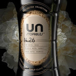 Downy Unstopables Number 26 in-wash laundry scent granules bottle showing rose and oakmoss fragrance details.