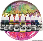 Jacquard alcohol ink bottles displayed alongside resin art and craft creation samples