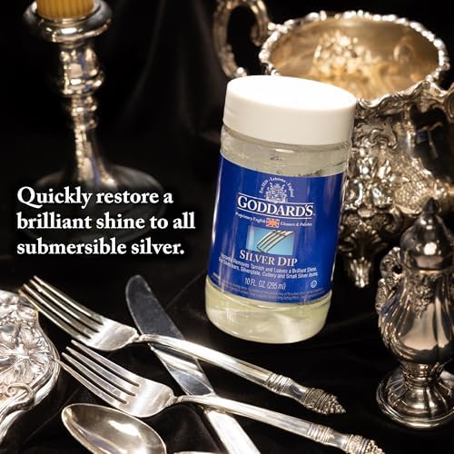 Intricate silver filigree earring being cleaned with Goddard's Silver Dip solution.