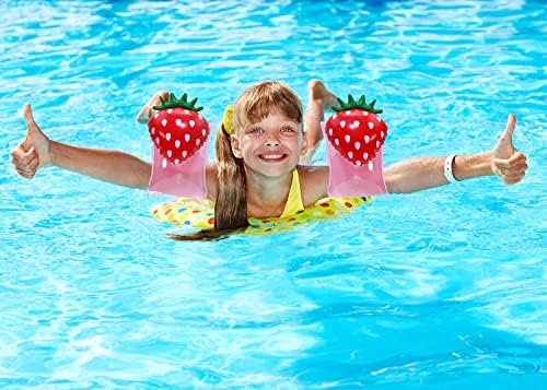 Kids wearing Penta Angel swim arm floats in a swimming pool