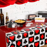 Side view of the casino theme party decorations setup using the Hosuly premium playing card pattern tablecloth.