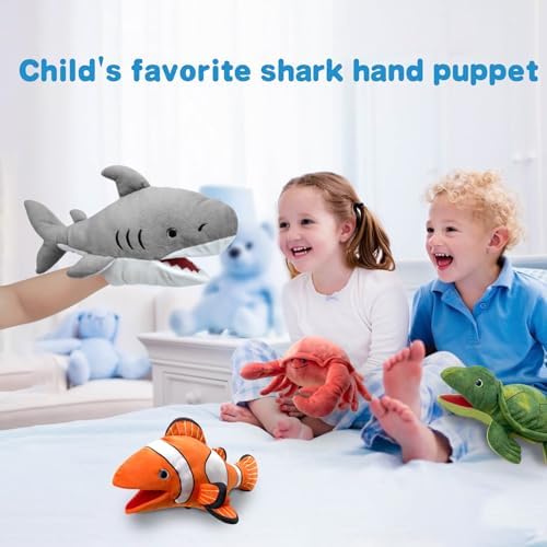 Child playing with Justqunseen shark hand puppet