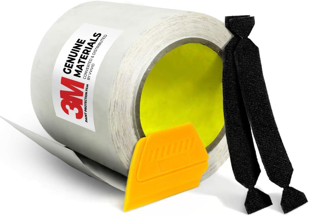 VViViD 3M Clear Paint Protection Vinyl Film roll with included yellow squeegee and black felt applicator tools for premium automotive scratch protection.