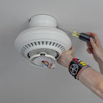 Tradesman pro magnetic wristband holding screws and drill bits.