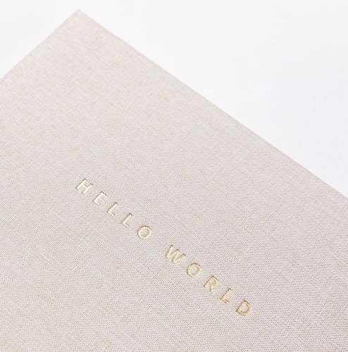 Open pages of the luxury 160 GSM paper baby journal illustrating milestone writing prompts