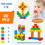 Toddlers playing cooperatively with bright color building blocks on a clean play mat