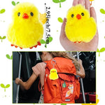 Close up of Baaxxango yellow plush chick figurine