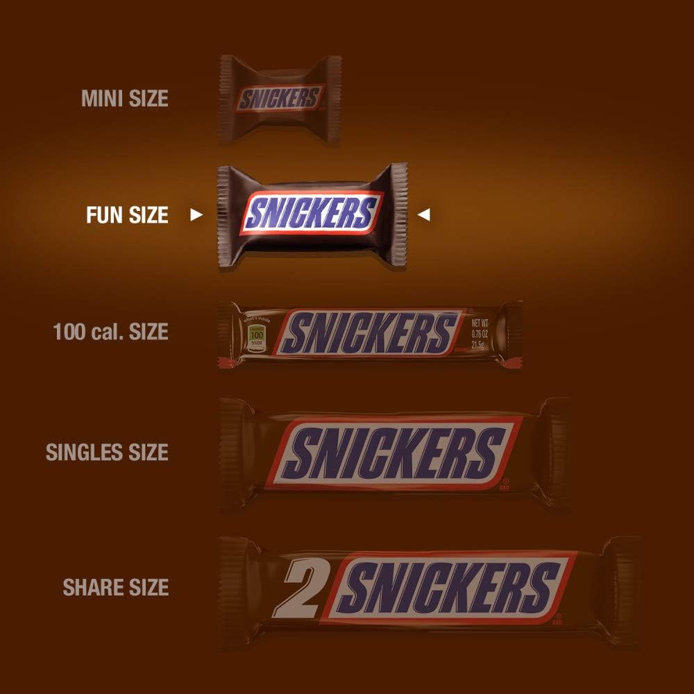 Snickers Original Fun Size bite-sized candies filling up a transparent glass snack bowl for party hosting.
