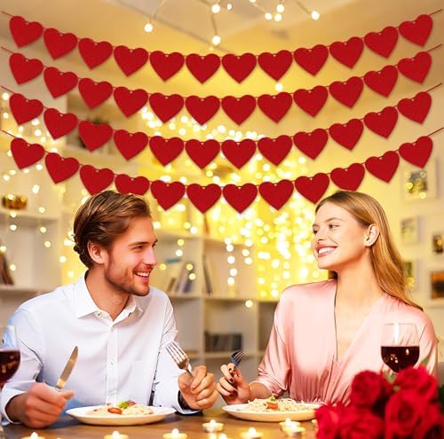 Close-up view of the delicate red hearts on the Partyprops Valentine decor string showing the pre-strung design.