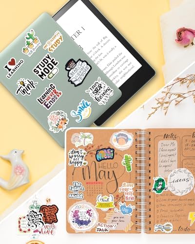Oomloid scrapbook accessories spread out to show variety of designs