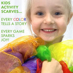 Children playing with rainbow colored Covelico sensory dance scarves