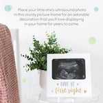 Tiny Ideas pregnancy keepsake frame showing the interchangeable matting detail for four by six inch photos.