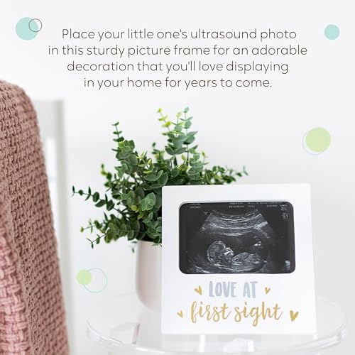Tiny Ideas pregnancy keepsake frame showing the interchangeable matting detail for four by six inch photos.
