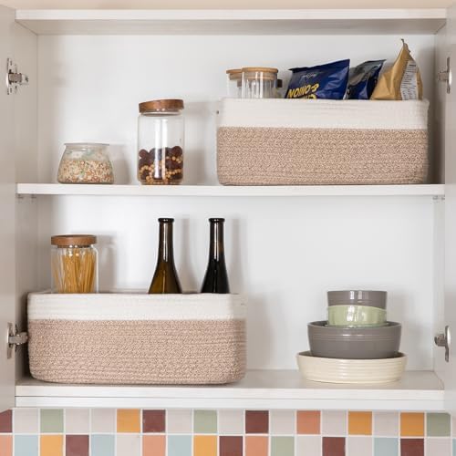 Modern minimalist yellow and white home organization basket set on a wooden desktop