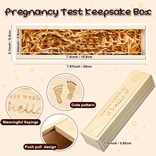 Sliding lid mechanism open on the natural wood baby announcement box with raffia.
