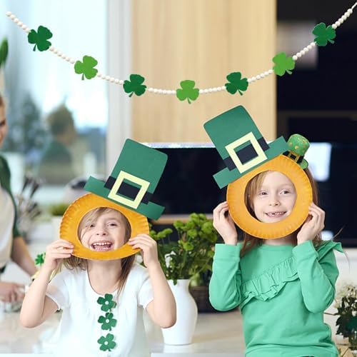 St Patricks Day beaded garland styled as a festive backdrop hanging on an indoor home bar wall.