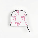Travel friendly pink dog carrier folded for storage