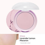 Close up view of the signature bow adorned cushion puff inside the Etude House makeup compact.