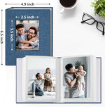 Vienrose compact picture book open displaying clear slip in pocket pages with vertical photos.