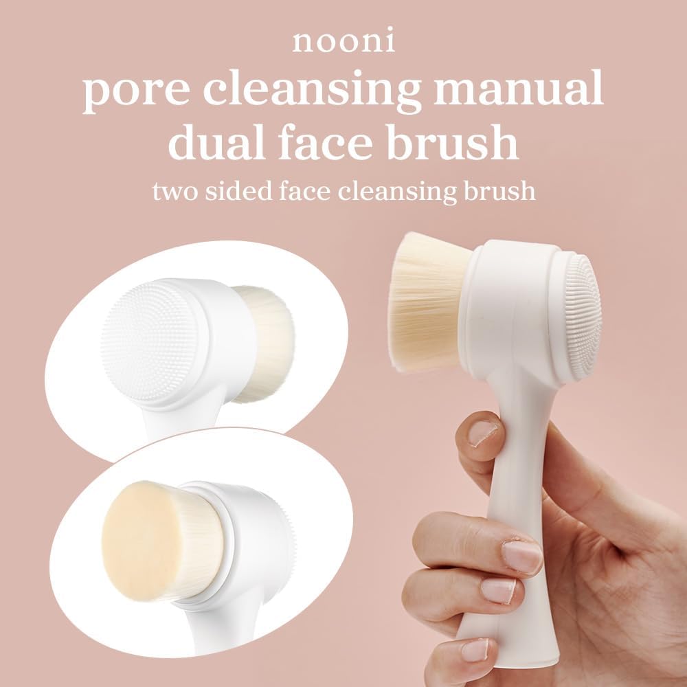 Nooni dual-sided facial wash brush displaying the textured silicone exfoliator side for deep T-zone massage